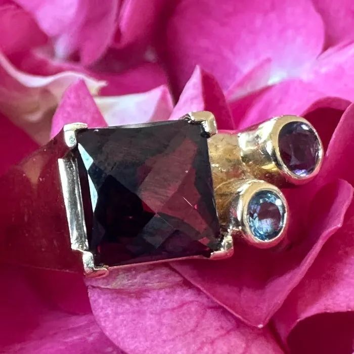 ONeills Estate Jewelry 14 Karat Yellow Gold Garnet Amethyst and Blue Topaz Ring Rings